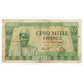 -32- Guinea, 5000 Francs 1958, kv. 1/1-, fl. - Pic10. / Numisma Mynthandel A/S: kr.  2940,-