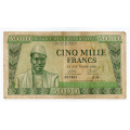 -33- Guinea, 5000 Francs 1958(2), kv. 1-, fl. - Pic9. Kvalitet 1/1- - 1/1+ (VG to VF). / Numisma Mynthandel A/S: kr.  394,-